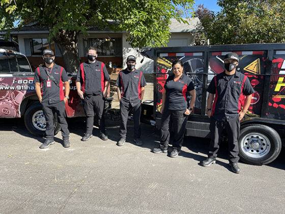 Cleaning crew outside of a home for red tag remedation in Stockton, CA