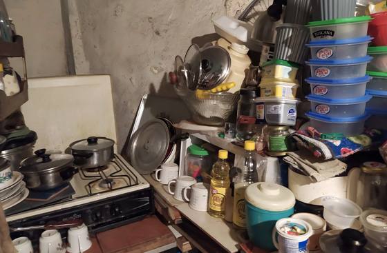 a pile of items in a hoarder clean up in Stockton 