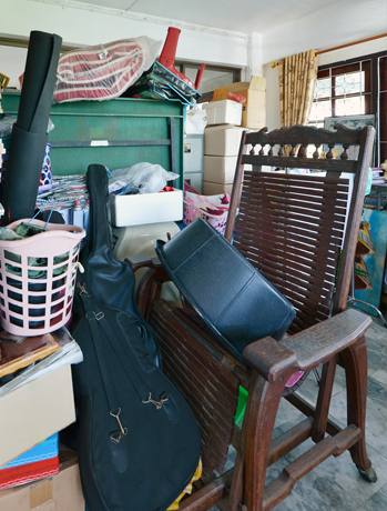 Inside a House with Items All Over Before Hoarder Clean Up in Los Gatos, CA