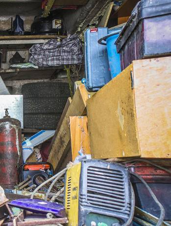 a disheveled room that is a part of Hoarder Clean-up in Richmond